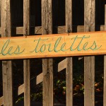 Les Toilettes sign